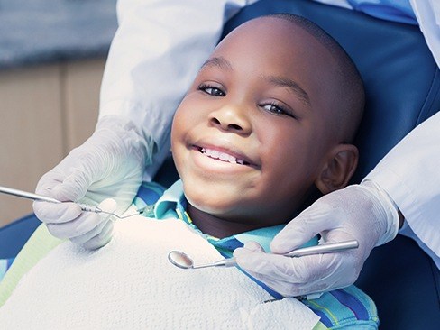 Child receiving dental exam