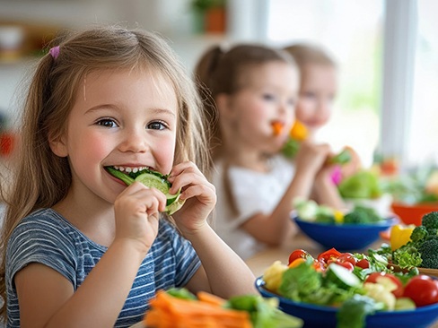 Little girl eating solid food