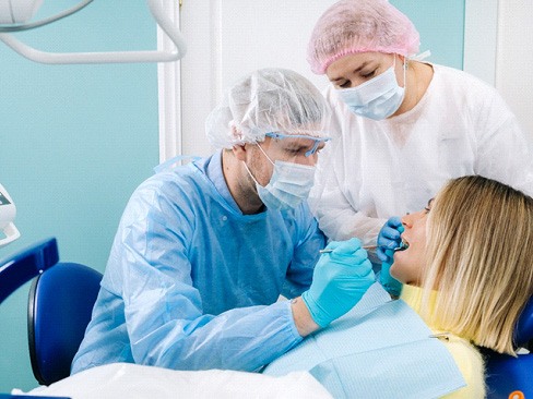 dentist examining teeth