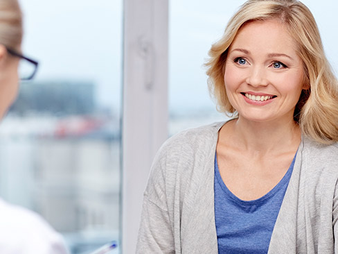 Smiling woman in dental chair