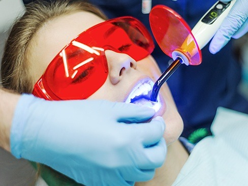 Woman receiving cosmetic dental bonding