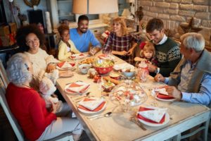 a family smiling and enjoying the holidays