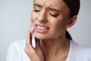 Woman experiencing dental pain