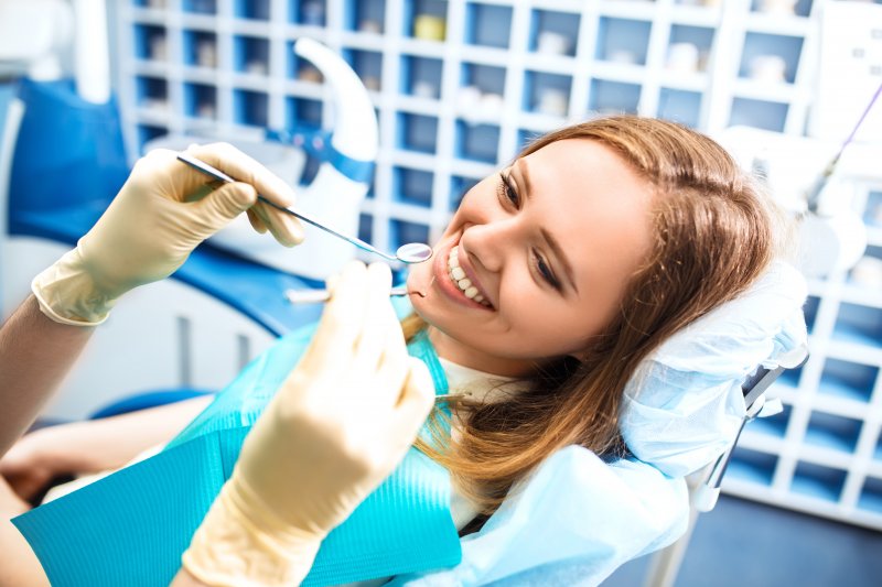 A woman about to undergo root canal treatment