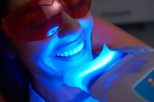 Woman having teeth whitened.